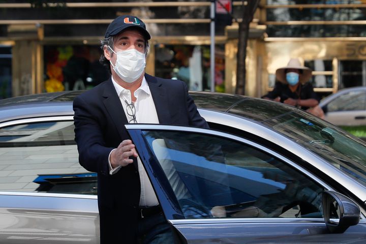 Michael Cohen arrives at his Manhattan apartment, Thursday, May 21, 2020, in New York. (AP Photo/John Minchillo)