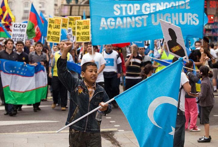 UK Uighurs and their supporters demonstrate through central London in 2009
