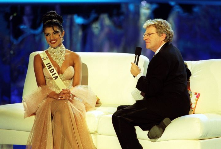 Chopra, then 18, speaks with host Jerry Springer during the Miss World 2000 contest.