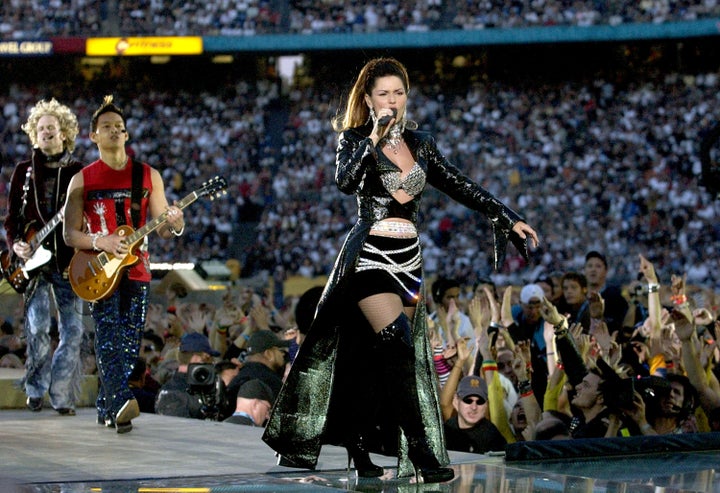 In a word: Epic. Shania Twain performs during the Super Bowl XXXVII halftime show in 2003 in San Diego, Calif. 