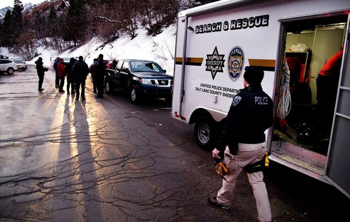 Search and rescue crews respond to the top of Utah's Millcreek Canyon, near Salt Lake City, where four skiers died in an avalanche on Saturday.