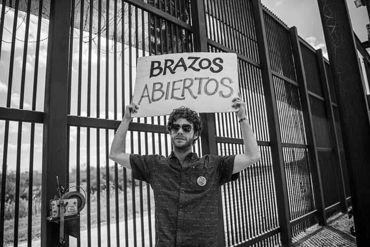 The author stands at the border during his time in Brownsville, Texas.