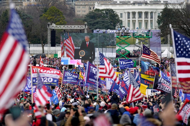 President Donald Trump supporters listen as he speaks during a rally in Washington on Jan. 6, 2021.
