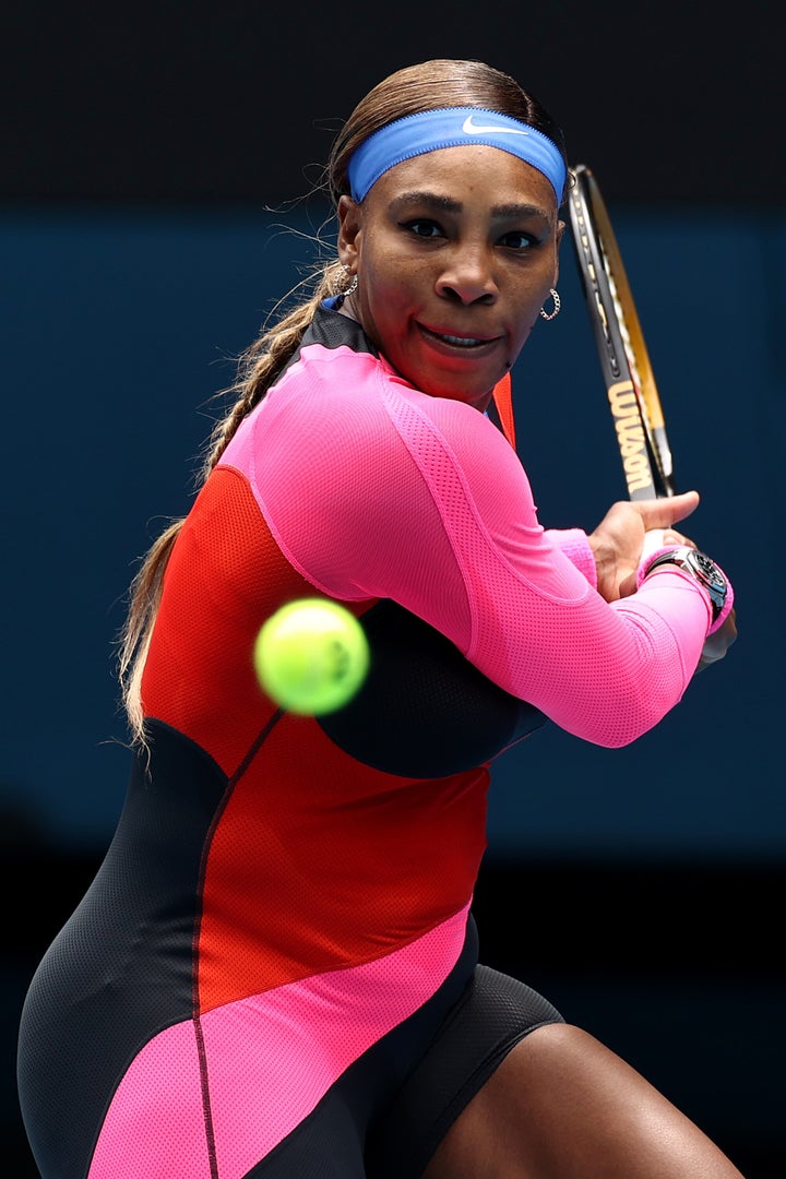 Serena Williams plays a backhand in her Women's Singles first round match against Laura Siegemund of Germany. 