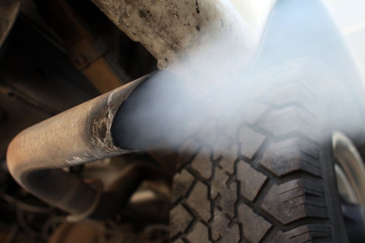 Exhaust flows out of the tailpipe of a vehicle in Florida.