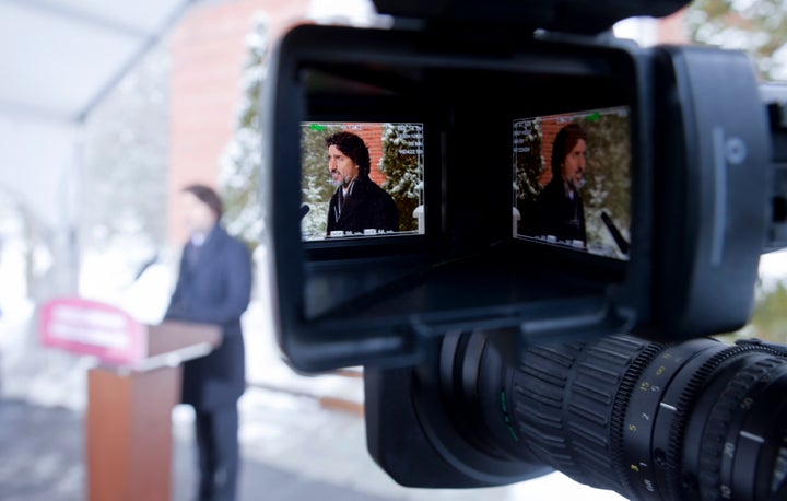 Two images of Prime Minister Justin Trudeau are seen in the viewfinder of a TV camera as he holds a news conference at Rideau Cottage in Ottawa on Feb. 5, 2021.