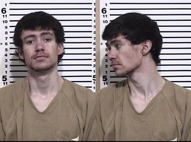 Police were attempting to arrest Tanner J.N. Shoesmith, 22, who had several outstanding warrants, when they mistakenly shot another man, authorities said.