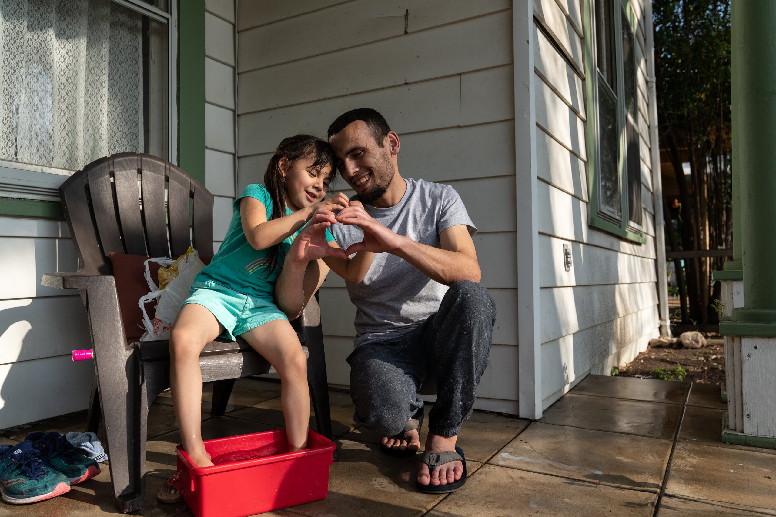 Muhammad and his elder daughter at the shelter in San Antonio.