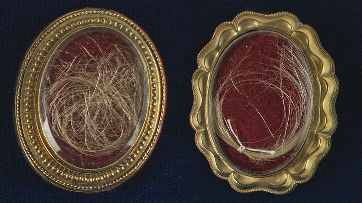 This undated photo released by RR Auction shows locks of hair from the heads of the first United States President George Washington, right, and from his wife Martha, left, up for auction between between Feb. 11-18, 2021, by the Boston-based auction firm.