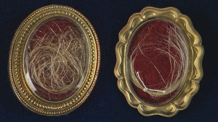 This undated photo released by RR Auction shows locks of hair from the heads of the first United States President George Wash
