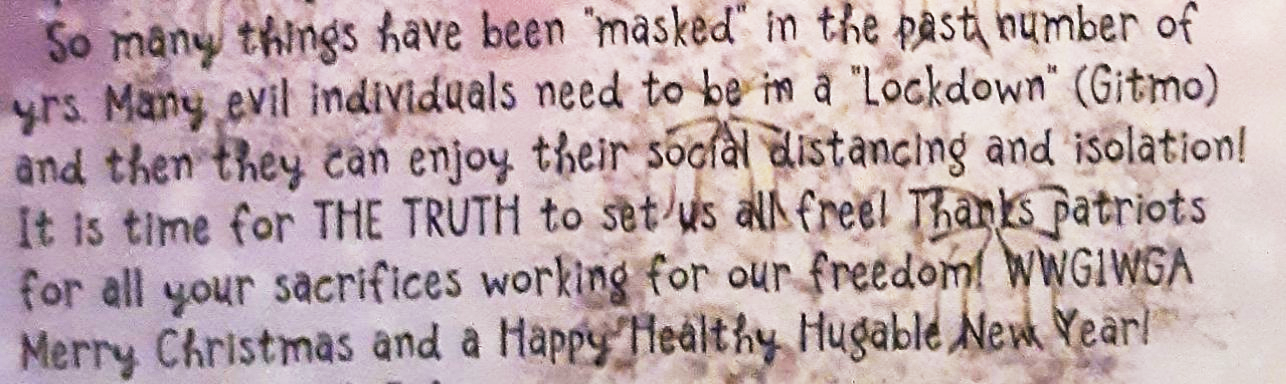 For the past three years in a row, Eric's mother has sent out Christmas cards containing references to QAnon, such as this on