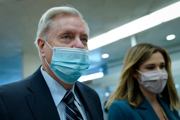 Sen. Lindsey Graham (R-S.C.) walks through the Senate subway on his way to the second day of former President Donald Trump's second impeachment trial at the U.S. Capitol on Feb. 10.