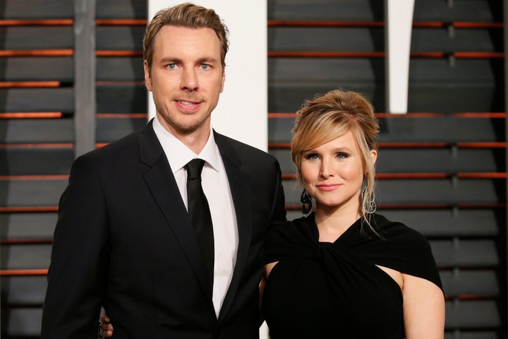 Kristen Bell and husband Dax Shepard arrive at the Vanity Fair Oscar Party in Beverly Hills, California, on Feb. 22, 2015.