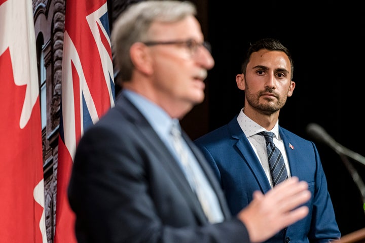 Dr. David Williams, Ontario's chief medical officer of health and Education Minister Stephen Lecce make an announcement at Queen's Park in Toronto, on Aug, 13, 2020.