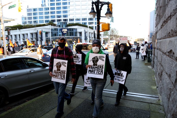 People attend a demonstration in support of Indian farmers protesting new agriculture laws on Dec. 5, 2020 in Vancouver.