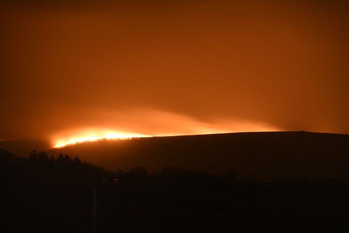 Photo taken from the Twitter feed of Benjamin Lawley of a large fire that has broken out on Dartmoor in Devon. 