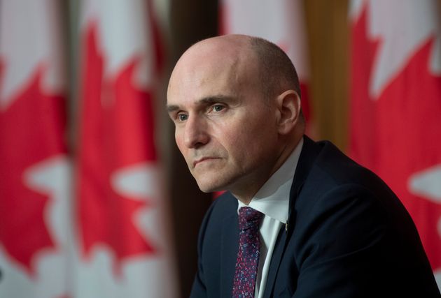 President of the Treasury Board Jean-Yves Duclos listens to a question from a reporter during a news...