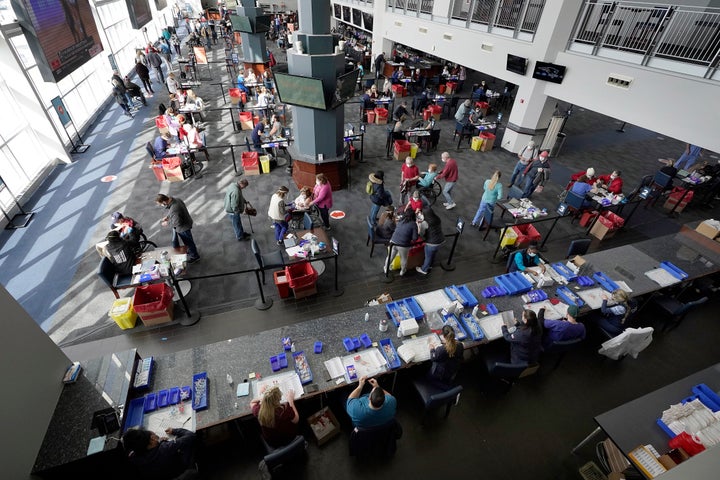 People are given COVID-19 vaccinations on Feb. 11, 2021, at Gillette Stadium in Foxborough, Massachusetts.