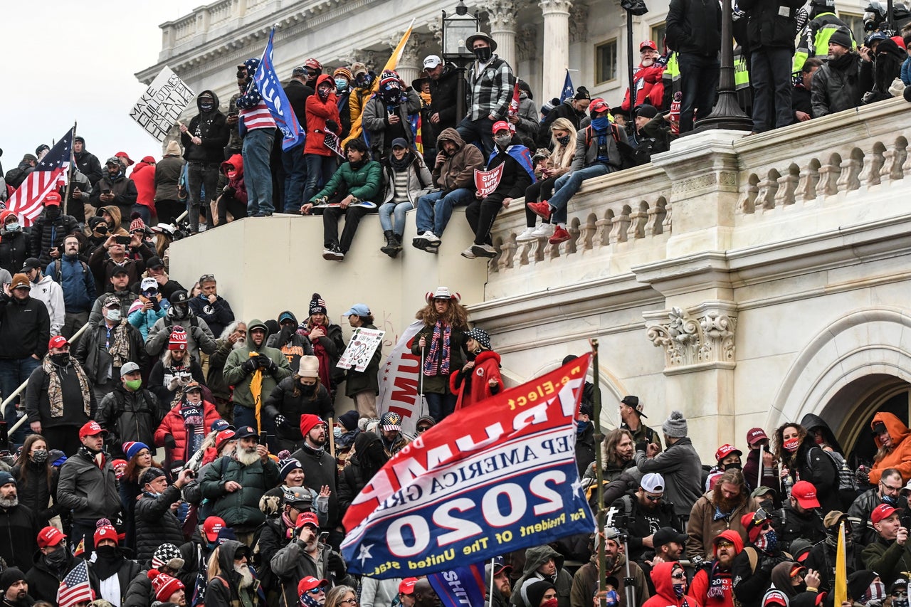 Supporters of President Donald Trump gather at the west entrance of the U.S. Capitol on Jan. 6 after busting through barriers manned by U.S. Capitol Police officers.