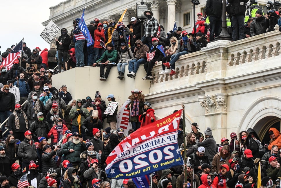 Supporters of President Donald Trump gather at the west entrance of the U.S. Capitol on Jan. 6 after busting through barriers