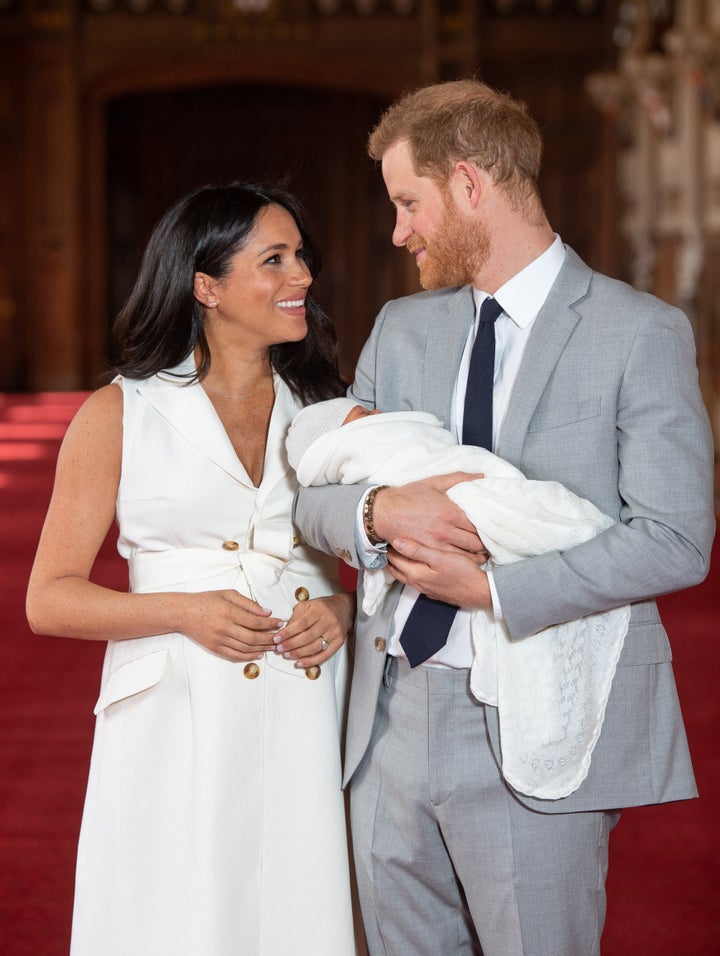 Meghan Markle and Prince Harry pose with their two-day-old son Archie Harrison Mountbatten-Windsor on May 8, 2019.