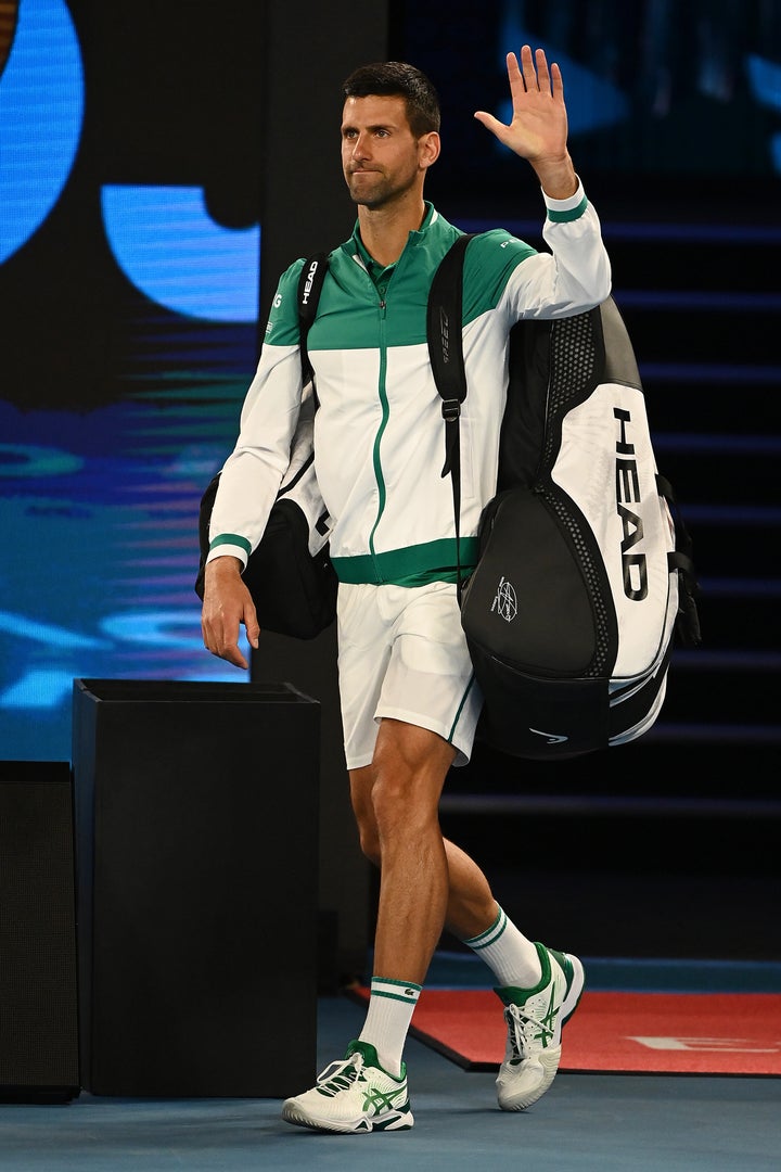 Novak Djokovic walks onto the court in his Men's Singles third round match during day five of the 2021 Australian Open at Melbourne Park on February 12, 2021 in Melbourne, Australia. 