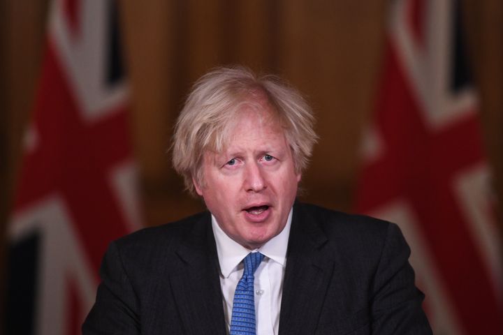 Boris Johnson talks during a Covid-19 media briefing in Downing Street on February 15