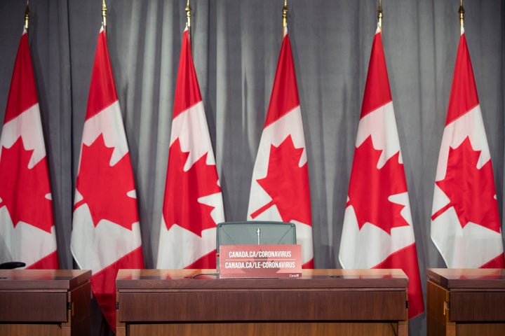 Government of Canada coronavirus information sign after a during a Government of Canada briefing on the COVID-19 pandemic on Parliament Hill in Ottawa on June 25, 2020.
