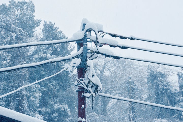 The telegraph pole in a snow day.