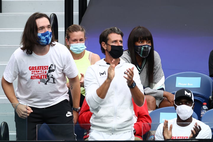 Alexis Ohanian, Patrick Mouratoglou, Jarmere Jenkins and Venus Williams watch the Women's Singles Quarterfinals match between Simona Halep of Romania and Serena Williams of the United States during the 2021 Australian Open at Melbourne Park on February 16, 2021 in Melbourne.