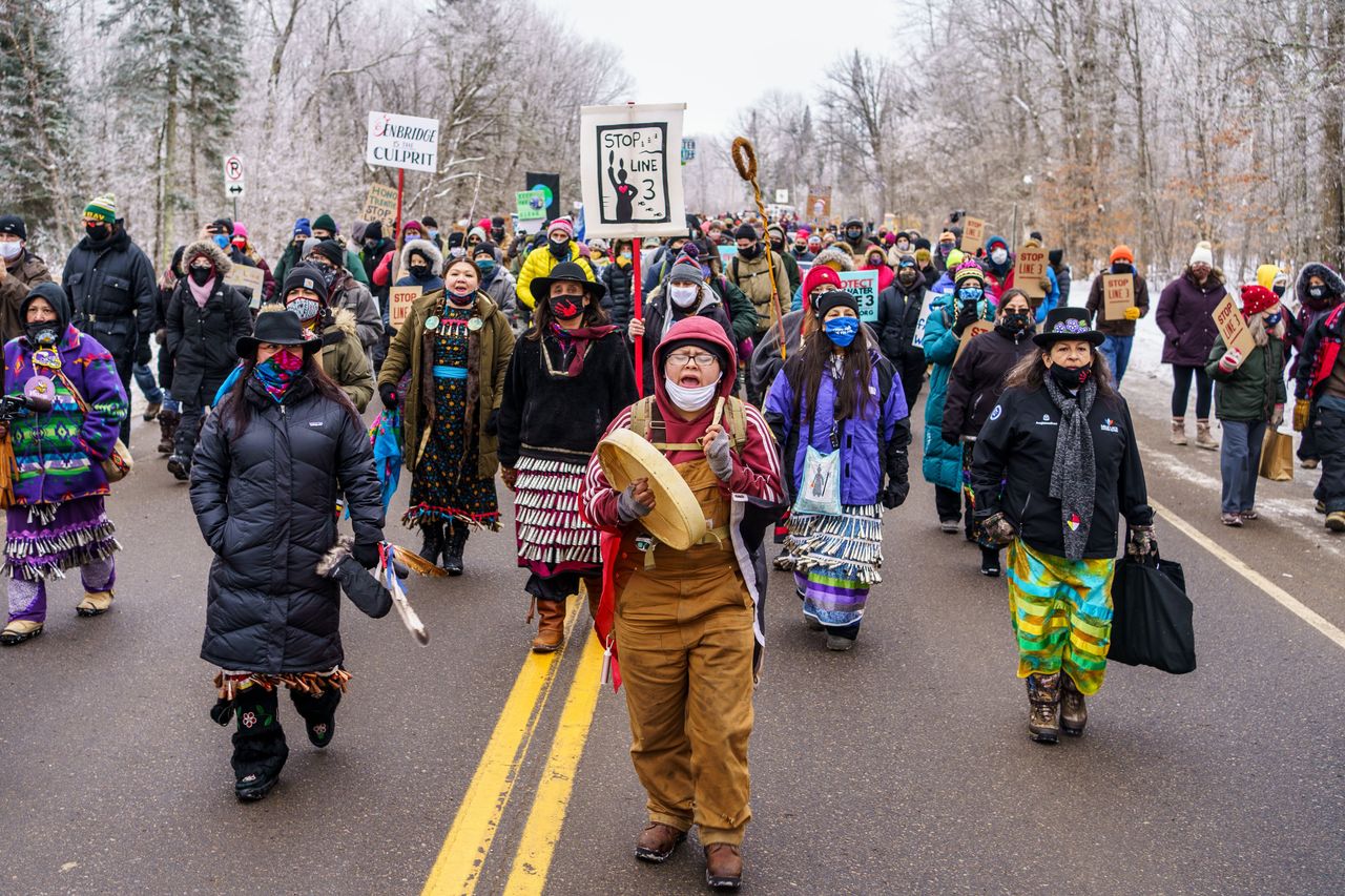 Environmentalists and Native American activists march to the construction site for the Line 3 oil pipeline near Palisade, Minnesota, on Jan. 9.