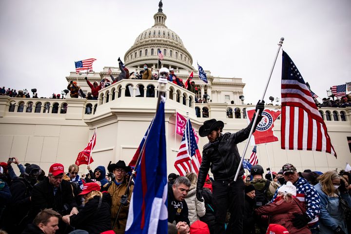Trump supporters storm the U.S. Capitol following a rally with President Donald Trump on Jan. 6. At his Senate impeachment trial, only seven members of the GOP voted to convict Trump of inciting the insurrection.