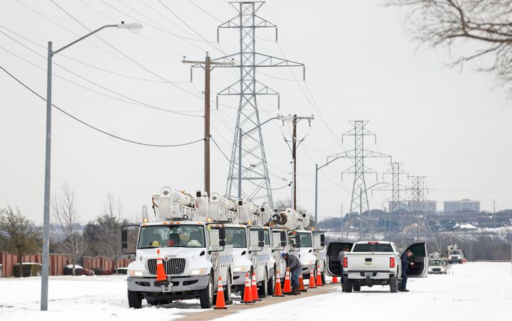 Pike Electric service trucks line up after the snowstorm on Feb. 16 in Fort Worth, Texas.