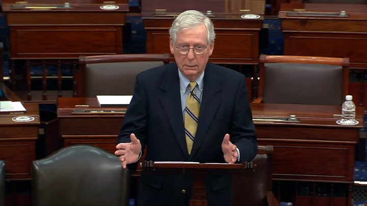 Minority leader Senator Mitch McConnell responds after the Senate voted 57-43 to acquit on the fifth day of former President Donald Trump's second impeachment trial at the US Capitol on February 13, 2021 in Washington, DC.