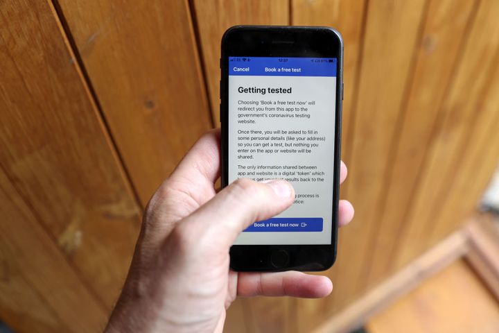 The NHS Covid-19 mobile phone application instructs the user on how to book a test.