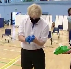 Boris Johnson Struggles To Put On A Glove, Compares Himself To O.J. Simpson