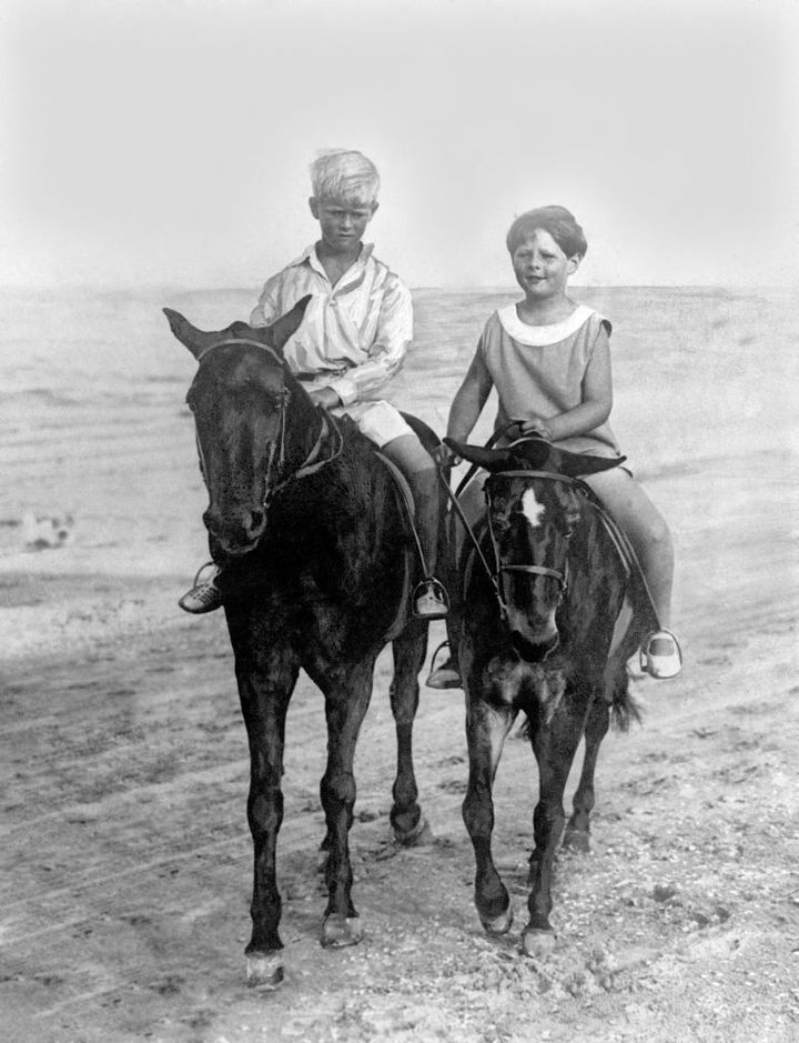 Prince Philip of Greece (left) rides with his cousin King Michael of Romania on the sands at Constanza in 1928