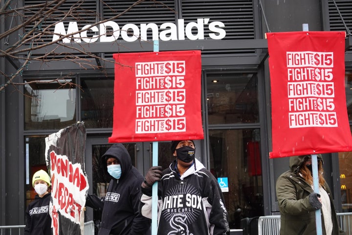 Demonstrators participate in a protest outside of McDonald's corporate headquarters on Jan. 15, 2021, in Chicago, Illinois. The protest was part of a nationwide effort calling for the minimum wage to be raised to $15 per hour.