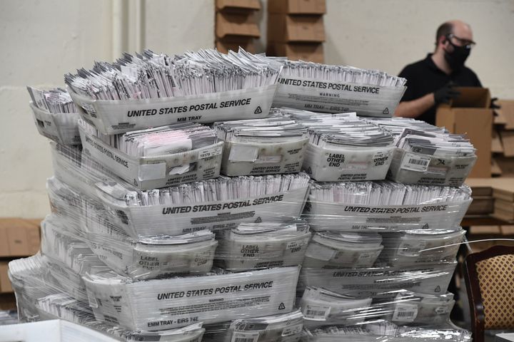 Mail-in ballots in their envelopes await processing at the Los Angeles County Registrar Recorders' mail-in ballot processing center at the Pomona Fairplex in Pomona, California, Oct. 28, 2020.
