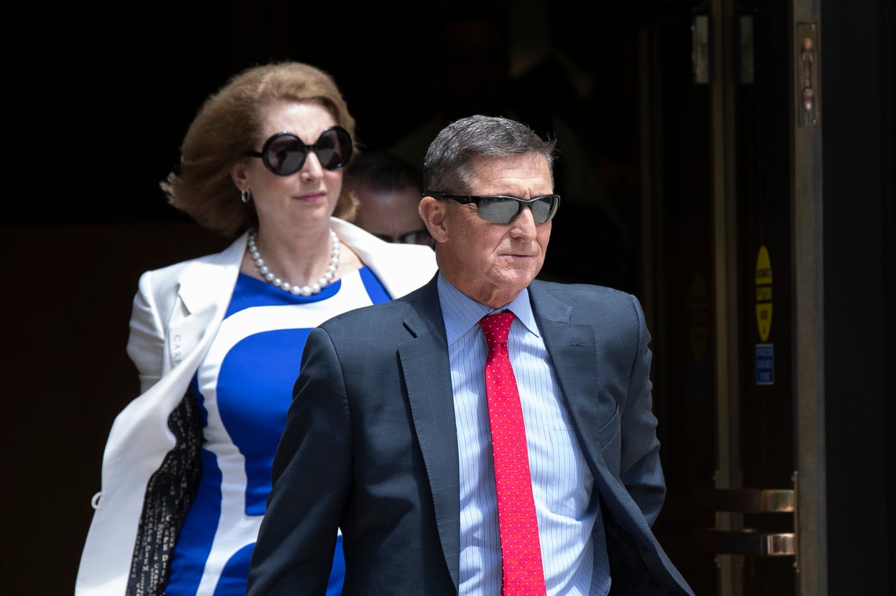 Flynn leaves the federal courthouse in Washington on June 24, 2019, followed by his lawyer Sidney Powell. She would become famous for her wild election theories.