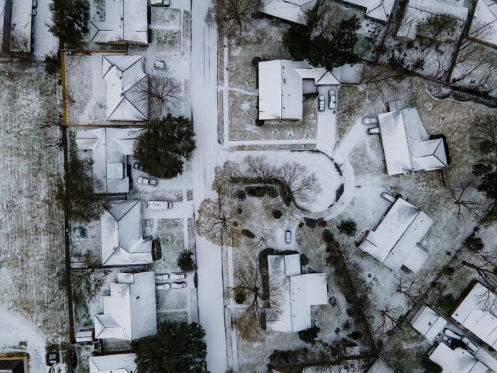 Homes in Houston's Westbury neighborhood covered in snow.&nbsp;