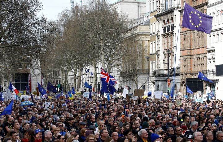 EU supporters, calling on the government to give Britons a vote on the final Brexit deal, participate in the 'People's Vote' march in central London.