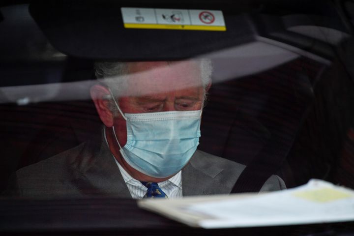 Prince Charles is driven away from King Edward VII's Hospital, where his father Prince Philip was admitted on Feb. 20, 2021.