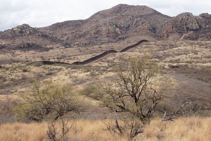 A new section of the border wall built under President Donald Trump extends through the remote wilderness of the Coronado National Forest, east of the town of Sasabe, Arizona. The wall and its construction have had a significant impact on the surrounding desert wilderness.