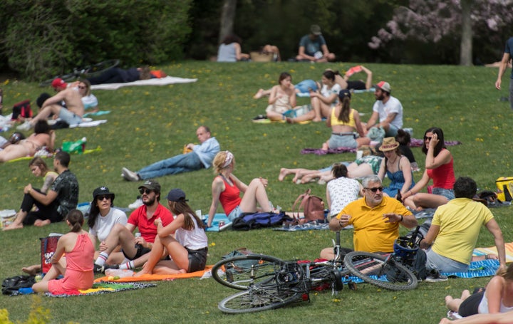 There was some return to normalcy in the spring, when people could safely see each other outside, as they did in this photo from a Montreal park in May.