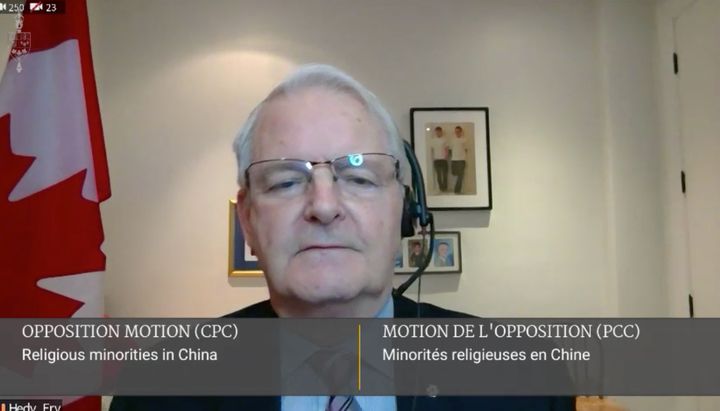 Foreign Affairs Minister Marc Garneau is shown on a video link abstaining on a House vote to recognize a Uighur genocide on Feb. 22, 2021.