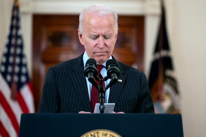 In a speech at the White House on Monday, President Joe Biden reads the number of Americans who have died of COVID-19.