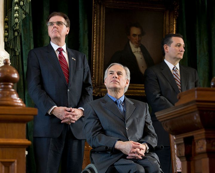 Texas' incoming Lt. Gov. Dan Patrick (left) and Gov. Greg Abbott listen, alongside Sen. Ted Cruz, during transition ceremonies at the Texas Capitol in January 2015.