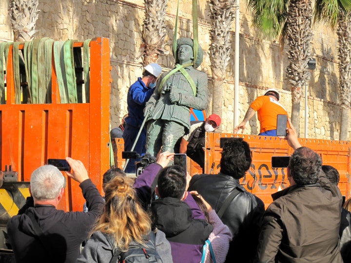 The last statue of former Spanish dictator Francisco Franco was removed on Tuesday from the city gates of