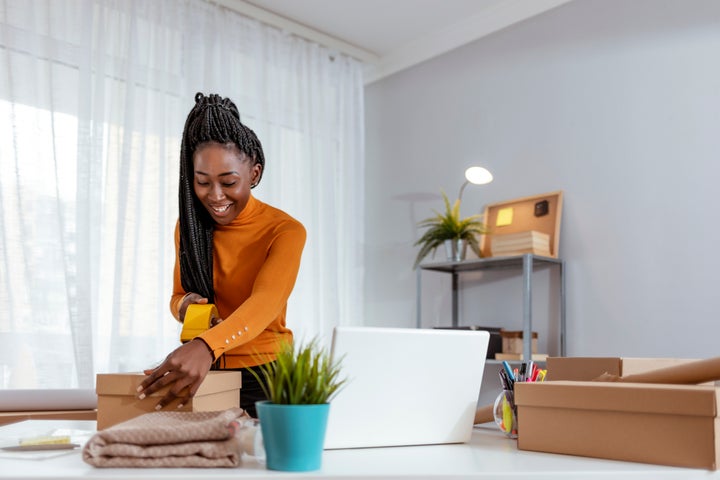 Woman packing at home